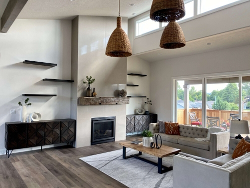 a living room with a fireplace and a couch