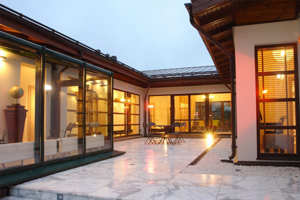 a house with a glass wall